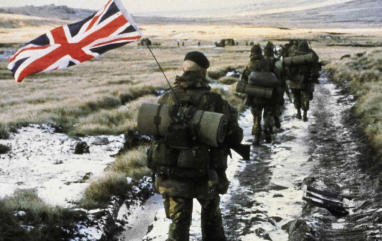 The yomp has been immortalized by the iconic picture of the commando flying the Union Jack as they started the 56 mile march to the mounts surrounding Stanley 