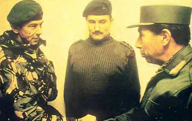General Jeremy Moore take the surrender of Brigadier General Mario Benjamin Menendez