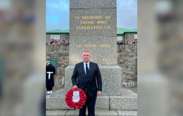 Minister Linares next to the Liberation Memorial, before laying wreath in the name of the government and people of Gibraltar