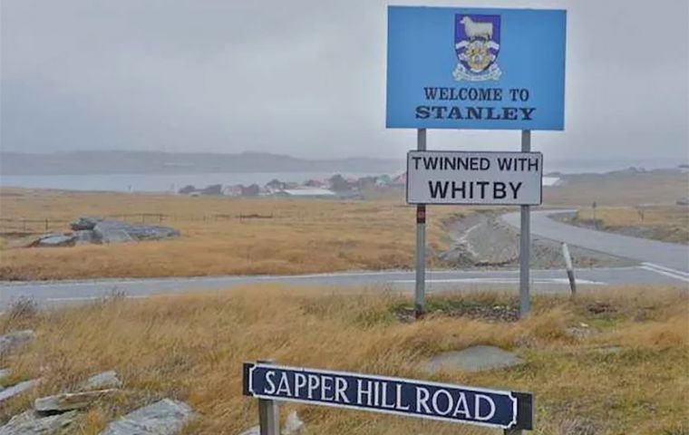 The sign of Stanley and Whitby twinning at the access of the Falklands capital 