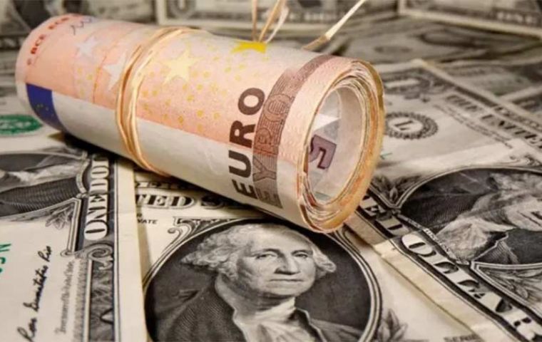A single Euro bought US$0.998 on the foreign exchange market at 12:45 GMT, down by 0.4% in Wednesday's trading
