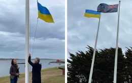 Ukrainian flag flying next to Falklands colors in Government House. Lawmakers with a Ukrainian flag at Gilbert House 