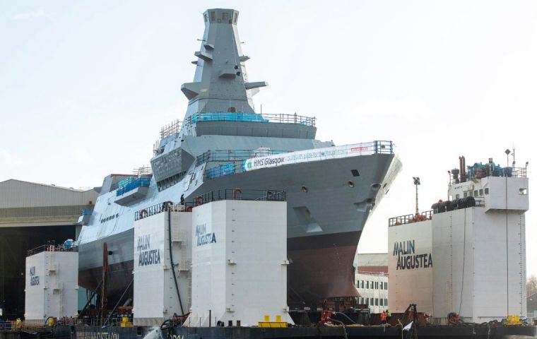 The ship is structurally complete and was slowly rolled from the shipyard's hard standing in Govan, Glasgow, on to a barge for transport down river to Scotstoun