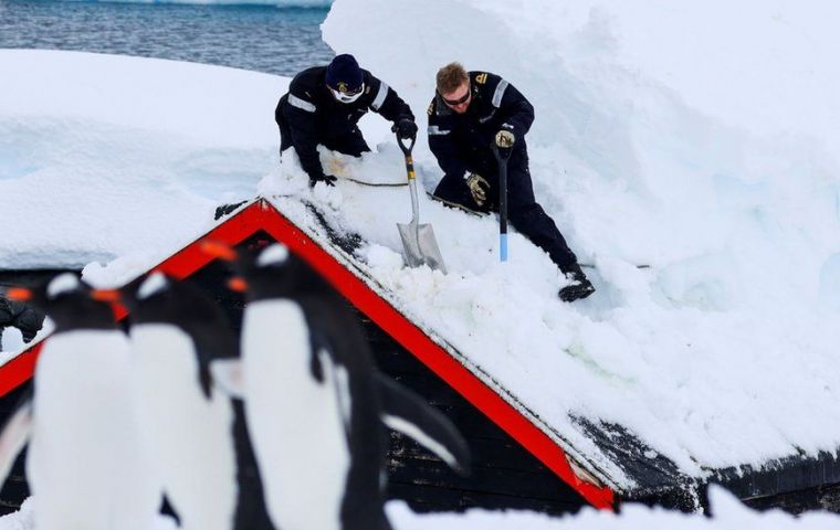 The new arrivals at Port Lockroy, with the Royal Navy team from HMS Protector