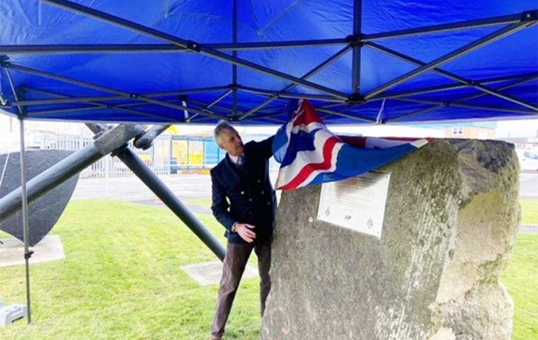 South Dorset MP Richard Drax, unveils the plaque commemorating the work carried out by dockworkers over a few dramatic weeks in 1982 to liberate Falklands