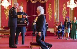 Sir Brian and King Charles joked about their ages during the ceremony