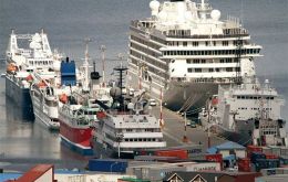 The port of Ushuaia on a busy day with cruise vessels and visitors
