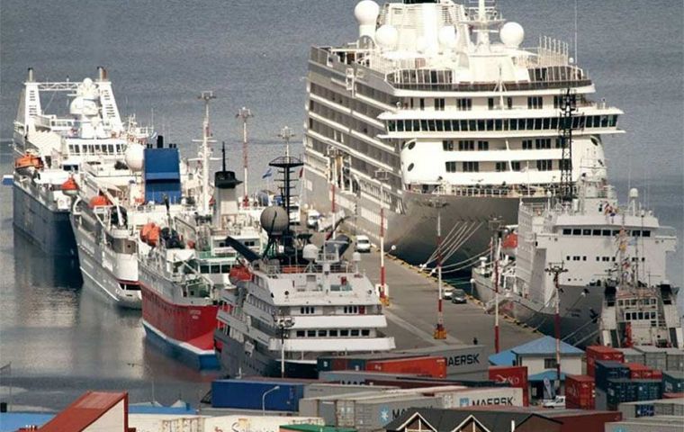 The port of Ushuaia on a busy day with cruise vessels and visitors