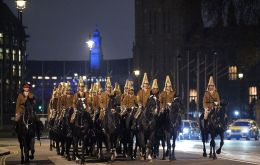Soldiers and horses pictured marching at night in London ahead of King Charles III coronation 