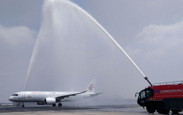 Firefighters performed the traditional water arch in Beijing