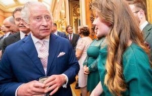MLA Barkman next to King Charles III during a reception held at Buckingham Palace