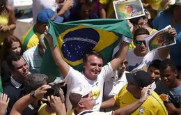 The rioters were women with Bibles and men with flags, Bolsonaro argued