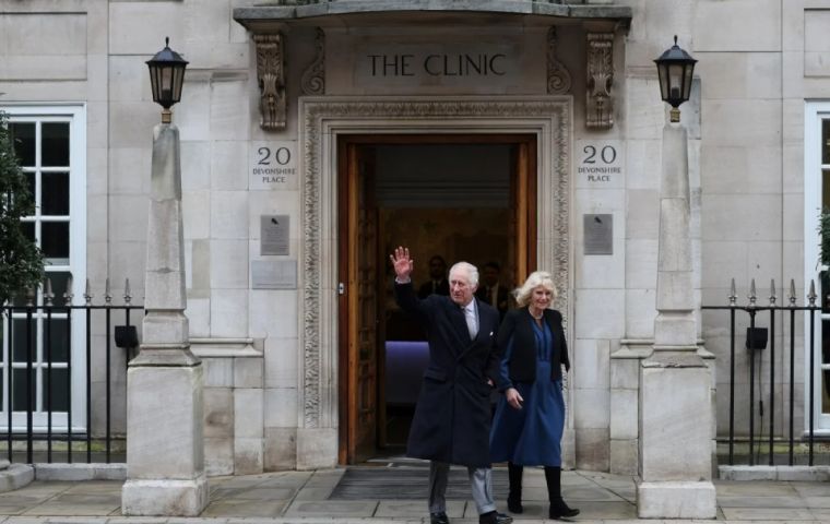 The King left the clinic in the afternoon with his wife, Queen Camilla, and waved to the cameras before getting into his car.