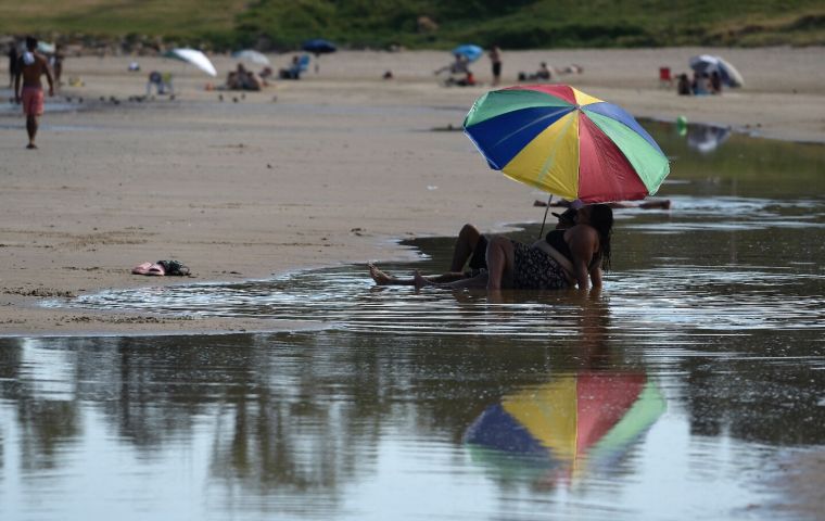 The unusually hot weather is expected to stay around at least for a week