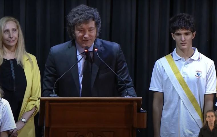 Speaking about Communism always brings on problems, the president joked as two students fainted during his appearance at the Catholic school he and his sister attended