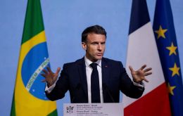 “Let’s put aside an agreement from 20 years ago and build a new” one, Macron insisted