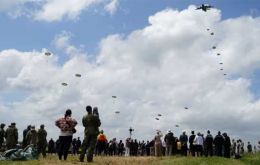 On the 80th anniversary, British, Belgian, Canadian and US paratroopers jumped onto fields at Sannerville, in a unique tribute to parachutists in June 1944 (Pic PA)