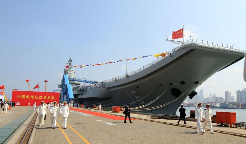 chinas first aircraft carrier enters into service